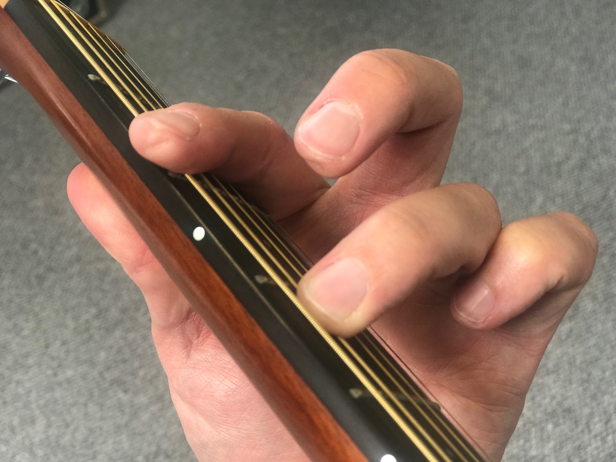 How To Play The F#m7 Chord On Acoustic Guitar