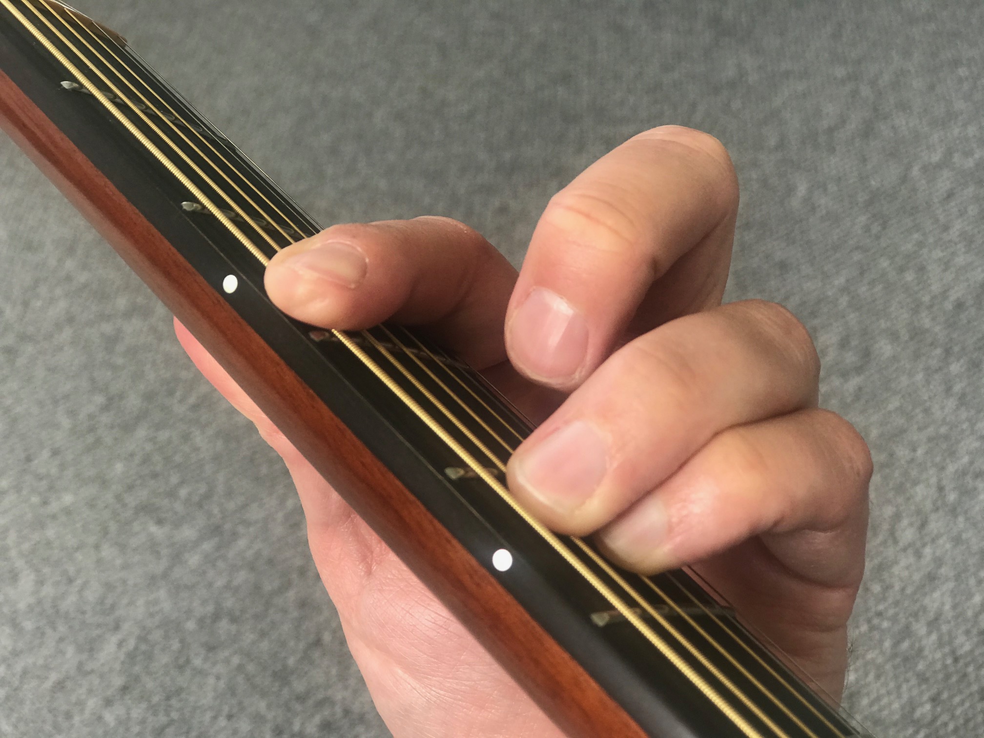 How To Play The Gm Chord On Acoustic Guitar
